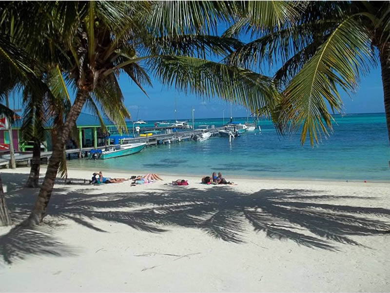 SunBreeze beach and pier with people laying on the beach