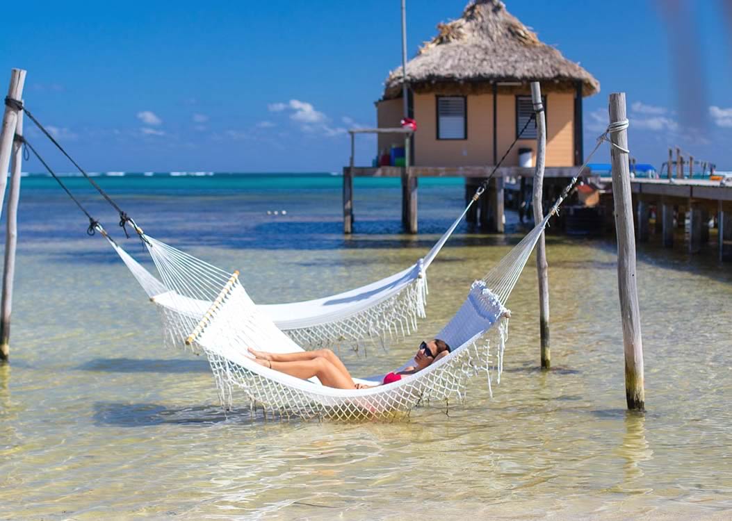 Girl in hammock on the beach