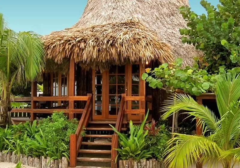 Honeymoon cabana facing the ocean in a beautiful garden setting