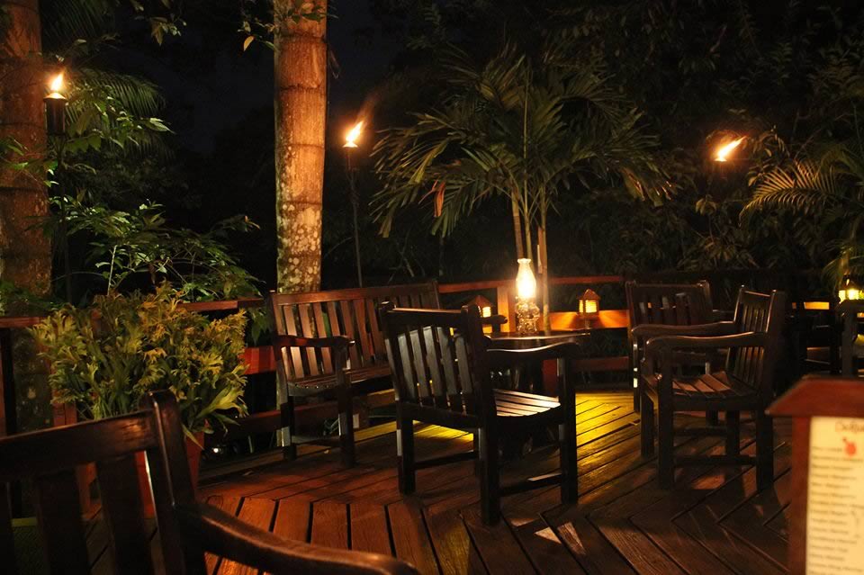 View of Chaa Creek restaurant deck at night