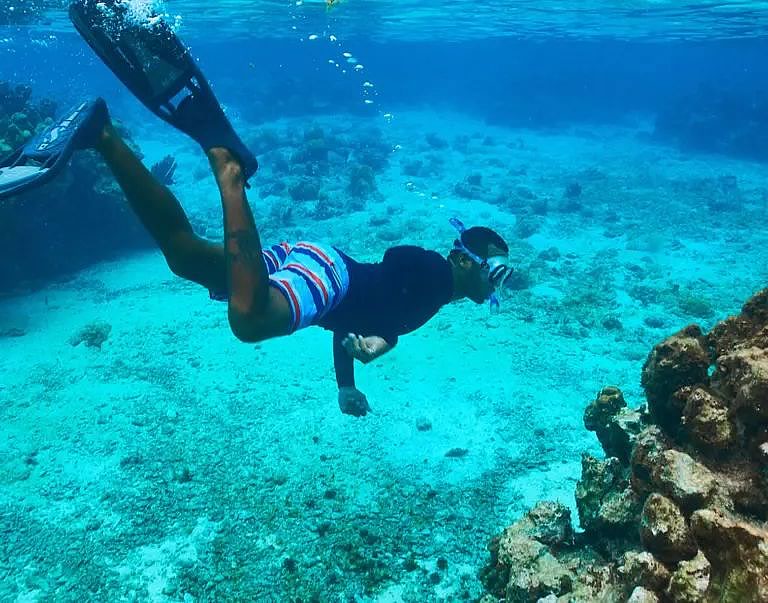 A snorkeler at Turneffe Atoll reef
