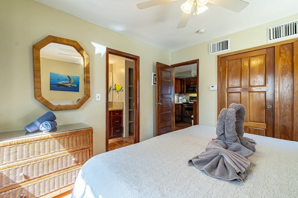 Interior of suite bedroom at Paradise Villas