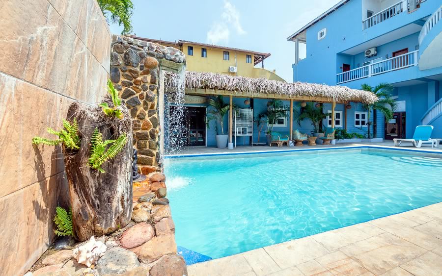 Freshwater swimming pool and fountain at Parrot Cove Lodge