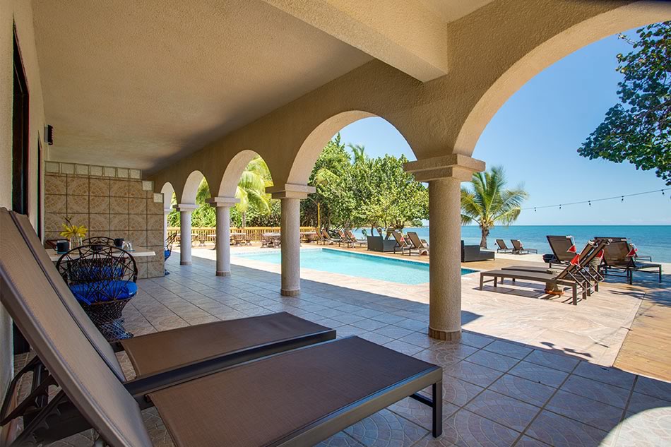 Beach lounge facing the ocean and pool