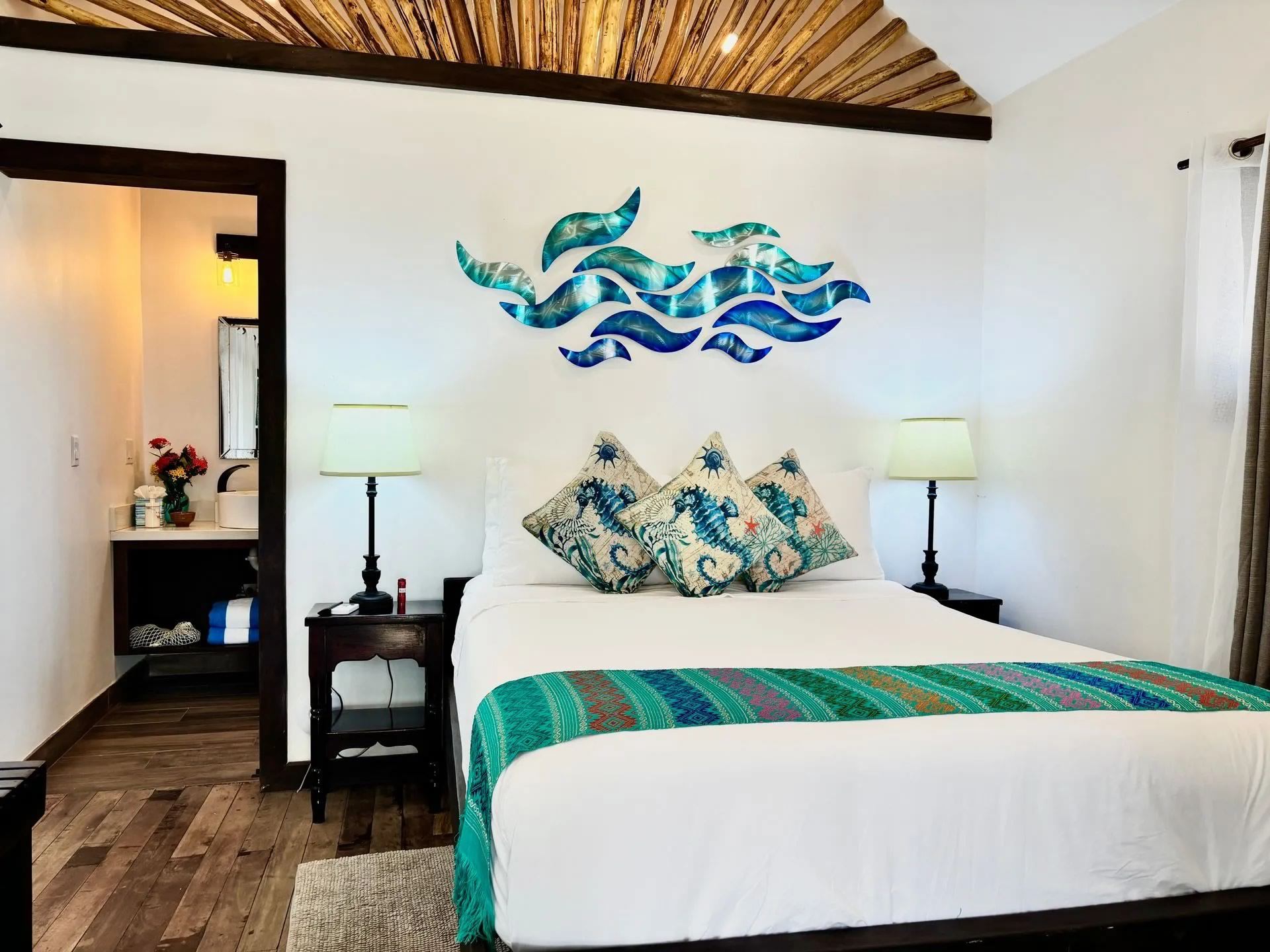 Interior of an Economy Suite with two beds at Blue Tang Inn