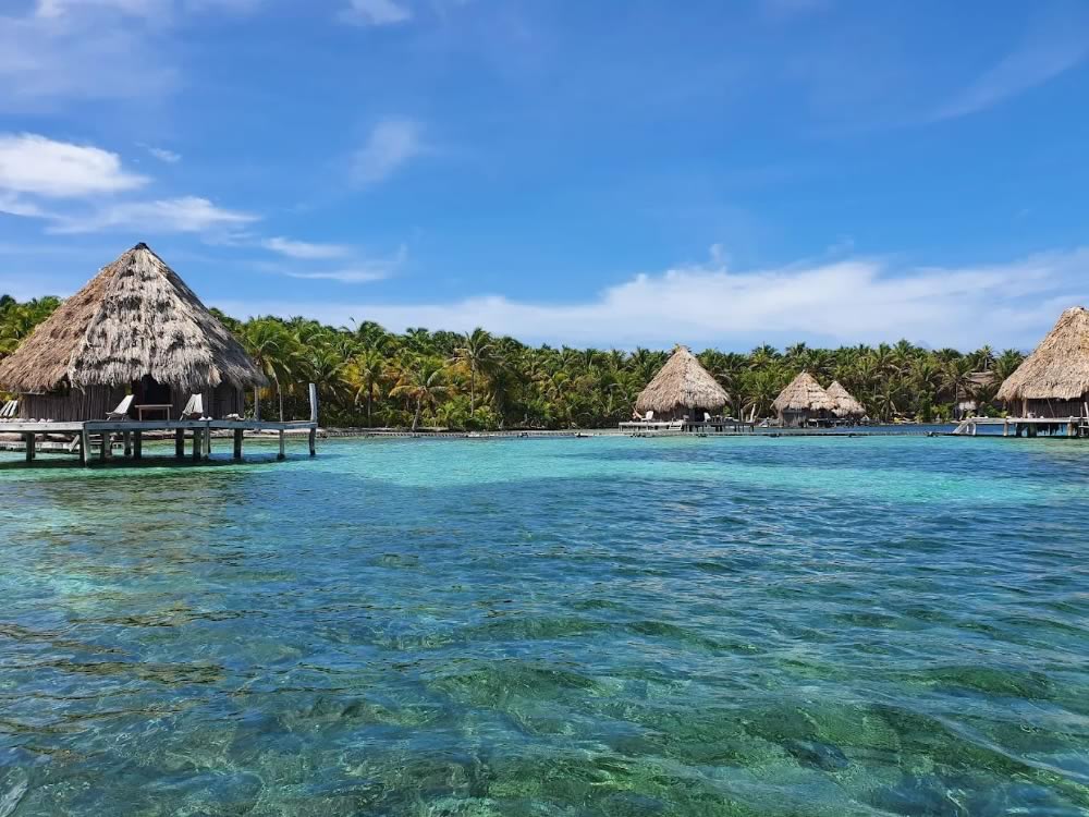 Cabins over the water at Glover's Reef Island Resort