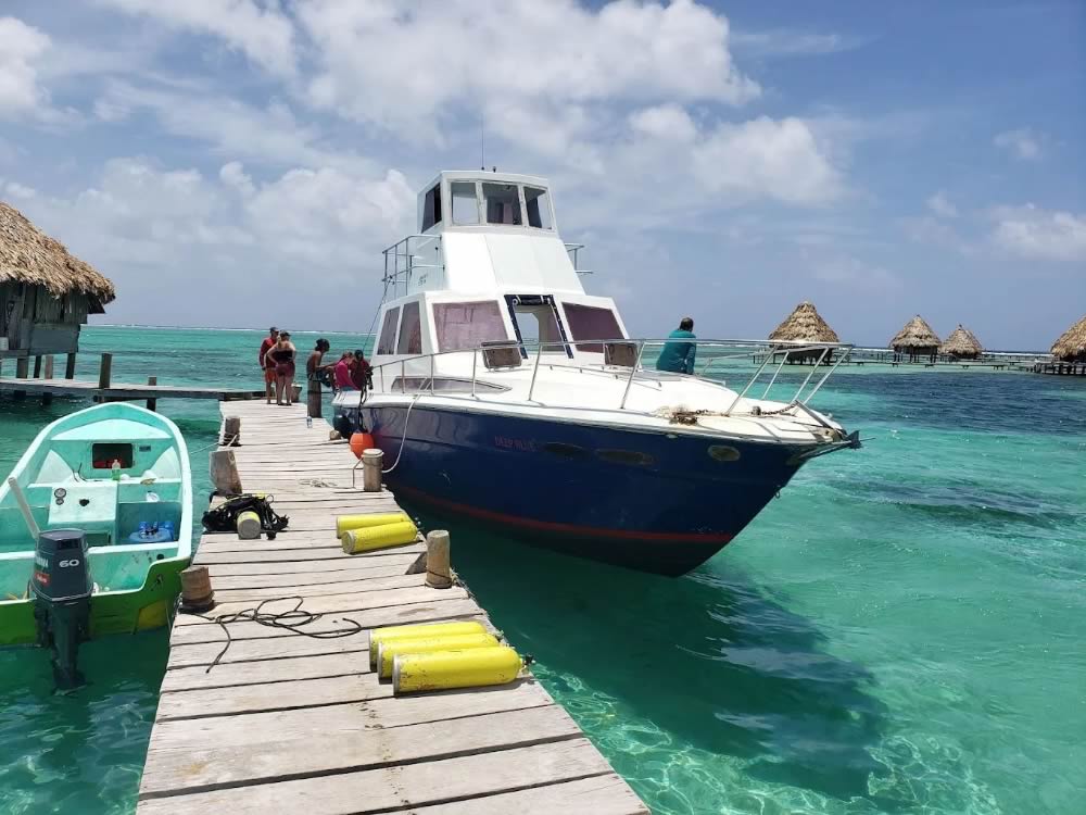 Seahorse dive shop dive boat dock at Glover's Atoll Resort pier