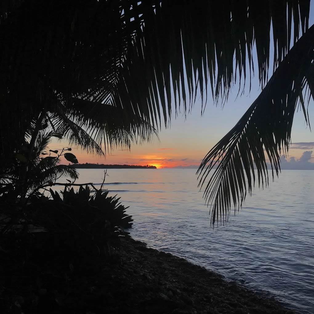 Sunset islands at Glover's Reef Atoll Resort, Northeast Caye