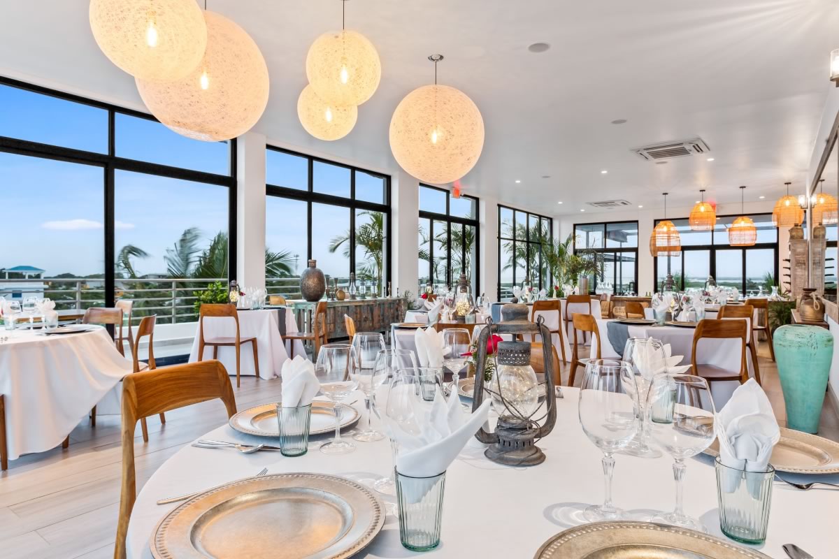 The Ellysian Hotel Restaurant featuring expensive silver wears and wine glasses