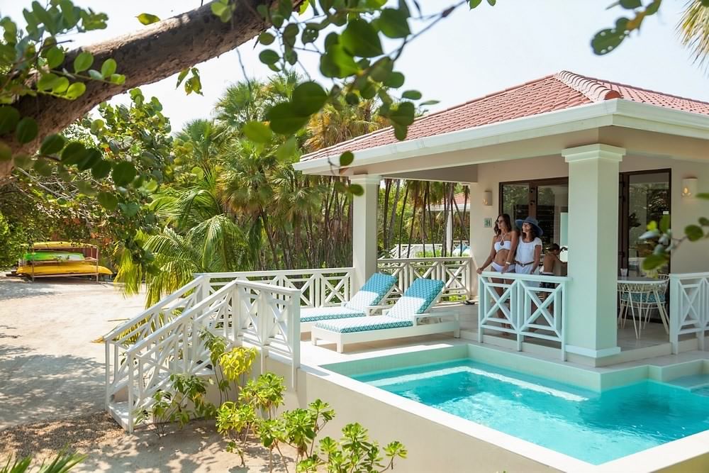 Two girls enjoying the ocean view from a Naia Resort Beach House