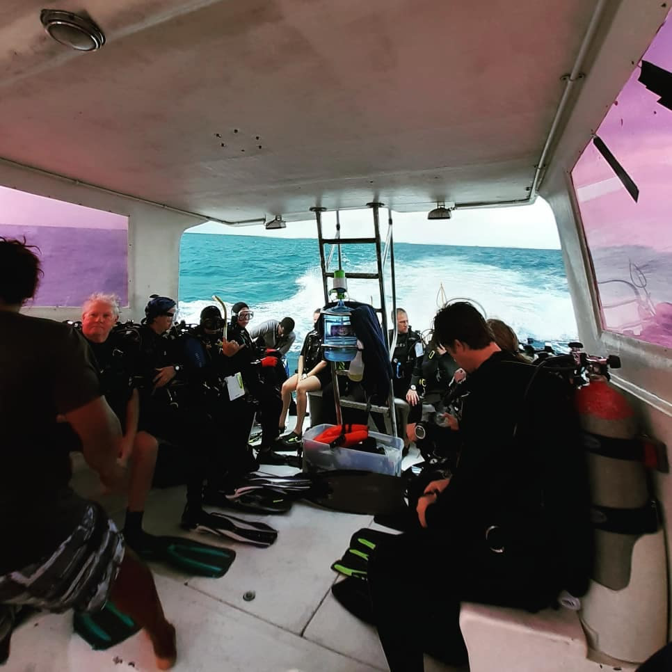 Scuba divers getting their gear ready