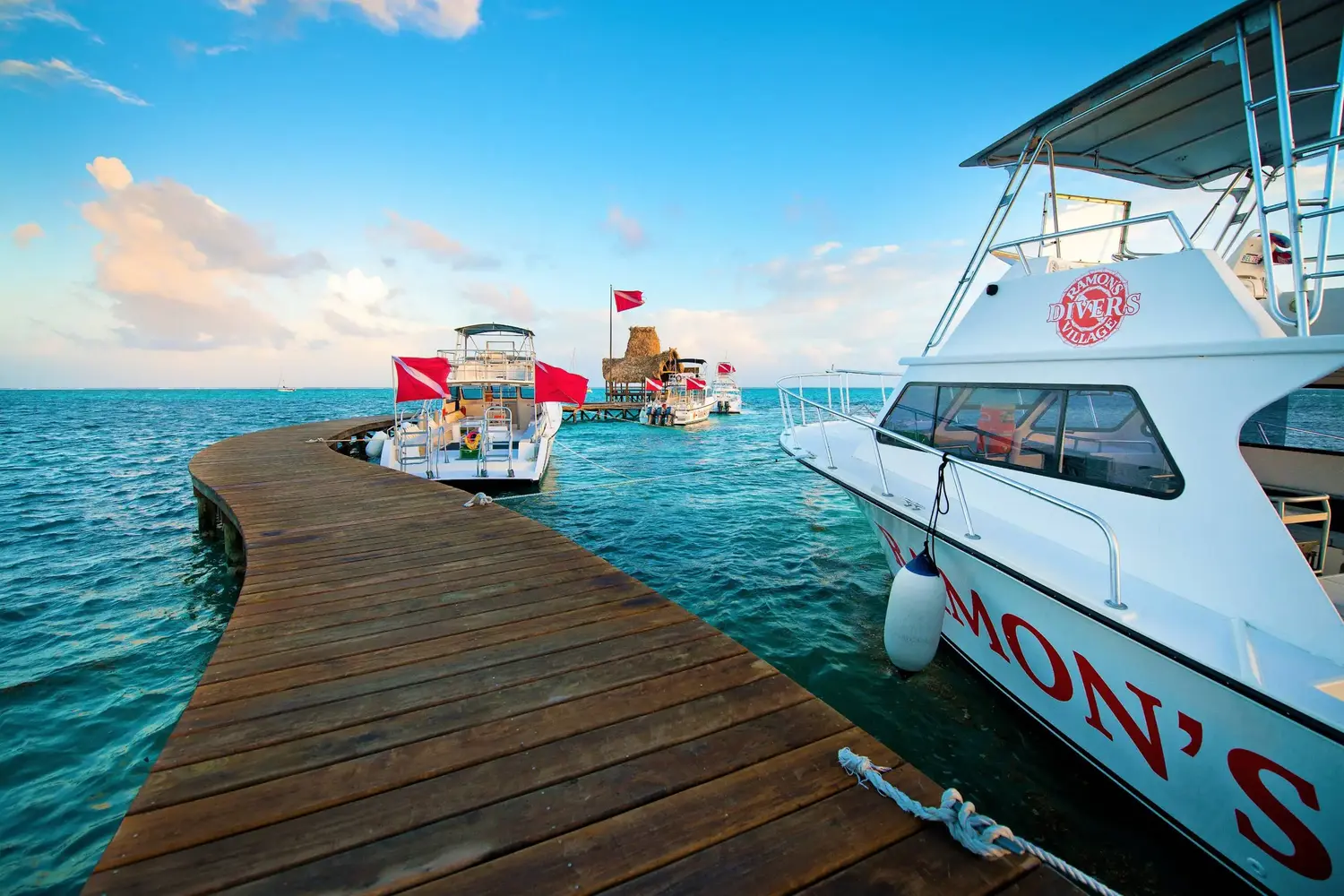 Pier with dive shop and dive boat