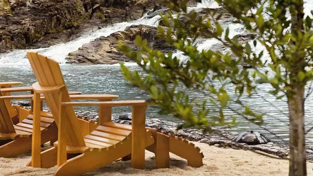 Relax area with chairs by waterfall