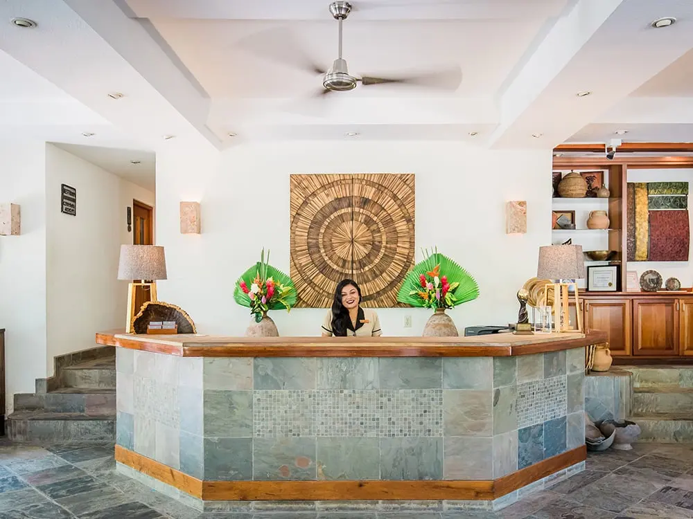 Receptionist in Kanna's colorful ground office