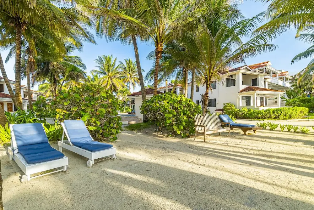 View of the grounds with garden and beach chairs