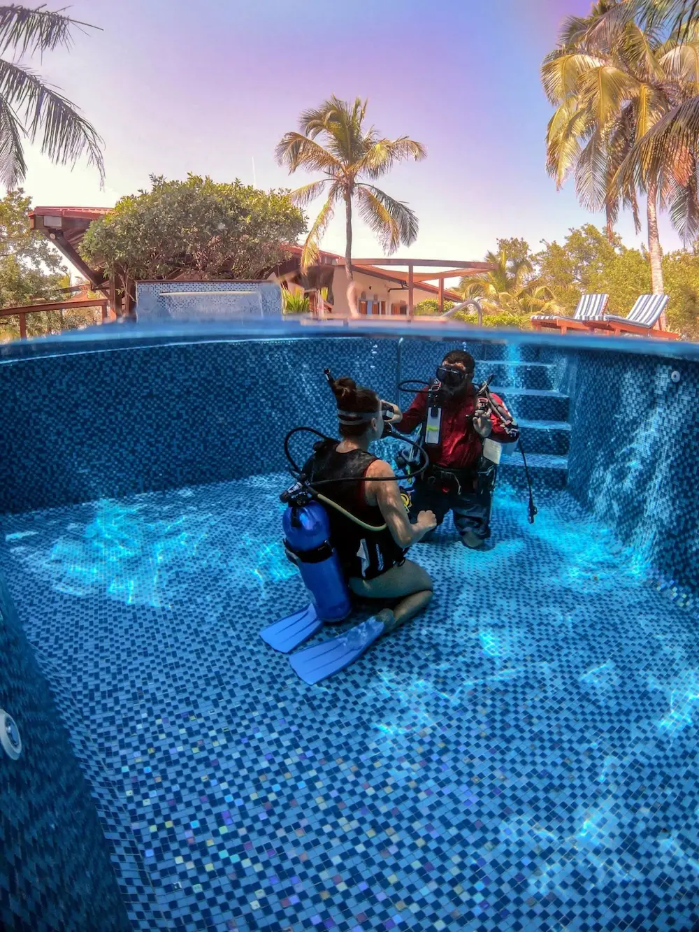Scuba diving lesson in pool