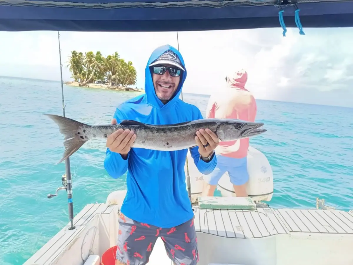 Fisherman holding a tuna