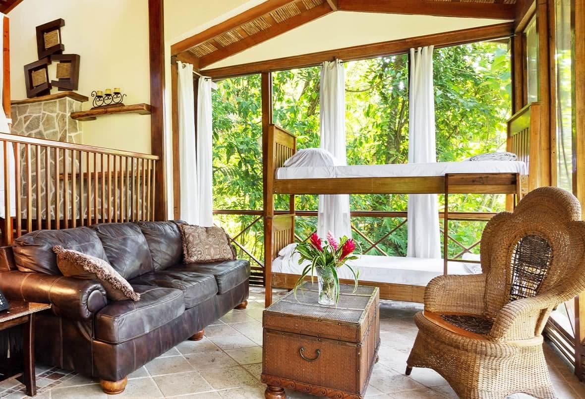 Caves Branch Jungle Lodge treehouse surrounded by tropical rainforest